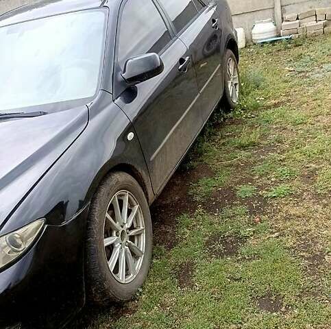 Черный Мазда 6, объемом двигателя 1.8 л и пробегом 283 тыс. км за 4500 $, фото 3 на Automoto.ua