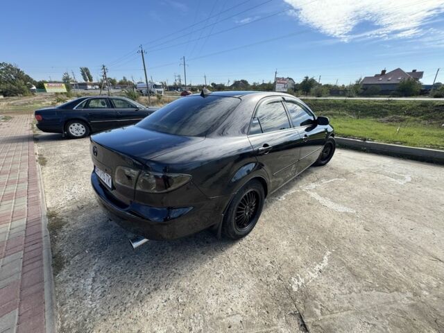 Чорний Мазда 6, об'ємом двигуна 2 л та пробігом 313 тис. км за 3800 $, фото 1 на Automoto.ua
