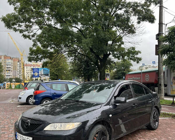 Черный Мазда 6, объемом двигателя 2 л и пробегом 390 тыс. км за 2699 $, фото 1 на Automoto.ua