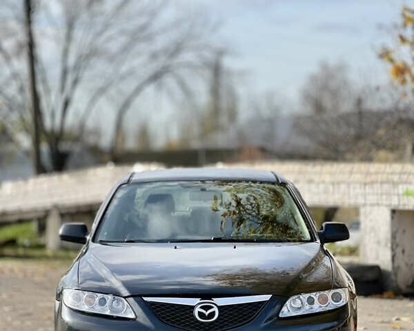 Чорний Мазда 6, об'ємом двигуна 2 л та пробігом 242 тис. км за 3499 $, фото 1 на Automoto.ua