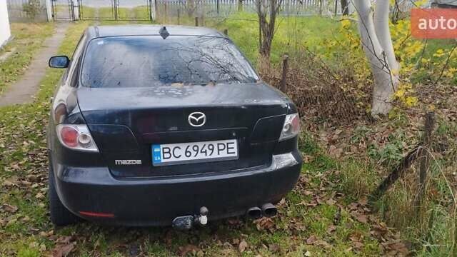 Черный Мазда 6, объемом двигателя 1.8 л и пробегом 350 тыс. км за 2500 $, фото 1 на Automoto.ua