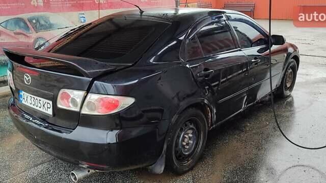 Черный Мазда 6, объемом двигателя 2 л и пробегом 317 тыс. км за 3000 $, фото 1 на Automoto.ua