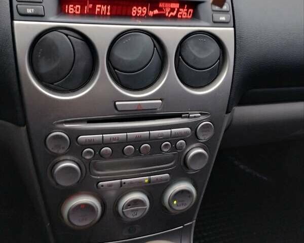 Черный Мазда 6, объемом двигателя 2 л и пробегом 350 тыс. км за 2400 $, фото 7 на Automoto.ua