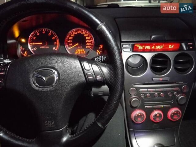 Черный Мазда 6, объемом двигателя 2 л и пробегом 249 тыс. км за 4555 $, фото 4 на Automoto.ua