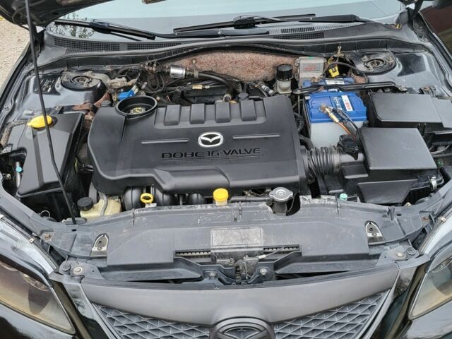 Черный Мазда 6, объемом двигателя 2 л и пробегом 320 тыс. км за 5300 $, фото 7 на Automoto.ua
