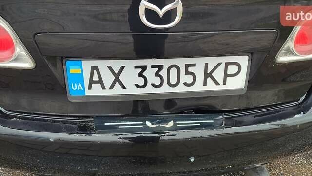 Черный Мазда 6, объемом двигателя 2 л и пробегом 317 тыс. км за 3000 $, фото 6 на Automoto.ua