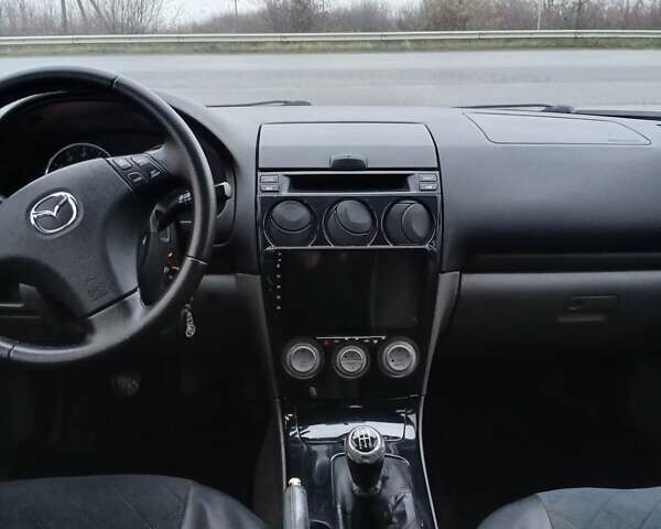 Чорний Мазда 6, об'ємом двигуна 1.8 л та пробігом 339 тис. км за 3600 $, фото 4 на Automoto.ua