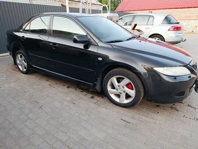 Черный Мазда 6, объемом двигателя 2 л и пробегом 300 тыс. км за 4500 $, фото 2 на Automoto.ua