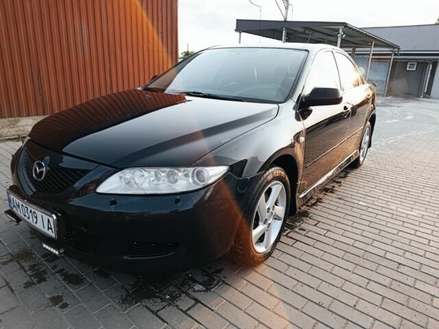 Черный Мазда 6, объемом двигателя 2 л и пробегом 300 тыс. км за 4500 $, фото 1 на Automoto.ua