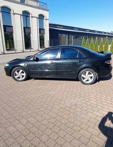 Черный Мазда 6, объемом двигателя 2 л и пробегом 374 тыс. км за 4199 $, фото 4 на Automoto.ua