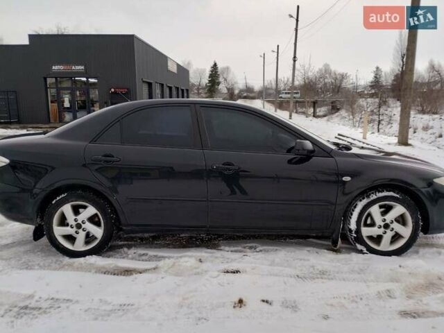 Черный Мазда 6, объемом двигателя 2 л и пробегом 350 тыс. км за 2400 $, фото 11 на Automoto.ua