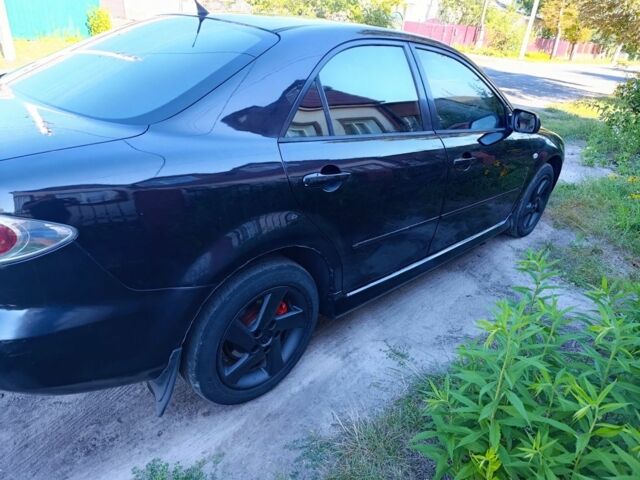 Черный Мазда 6, объемом двигателя 2 л и пробегом 350 тыс. км за 2999 $, фото 1 на Automoto.ua