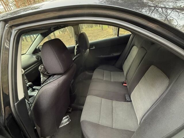 Черный Мазда 6, объемом двигателя 2 л и пробегом 270 тыс. км за 5500 $, фото 7 на Automoto.ua