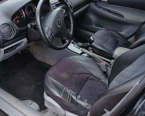 Чорний Мазда 6, об'ємом двигуна 1.8 л та пробігом 339 тис. км за 3600 $, фото 3 на Automoto.ua