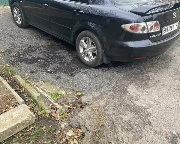 Черный Мазда 6, объемом двигателя 2 л и пробегом 416 тыс. км за 4800 $, фото 4 на Automoto.ua