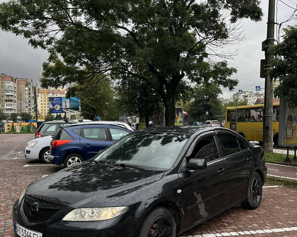 Черный Мазда 6, объемом двигателя 2 л и пробегом 390 тыс. км за 2699 $, фото 11 на Automoto.ua