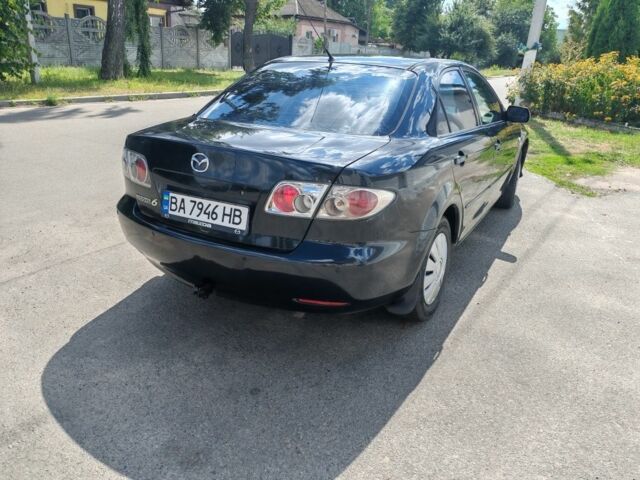 Чорний Мазда 6, об'ємом двигуна 2 л та пробігом 307 тис. км за 3351 $, фото 1 на Automoto.ua