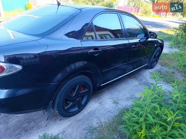 Чорний Мазда 6, об'ємом двигуна 2 л та пробігом 300 тис. км за 4500 $, фото 2 на Automoto.ua