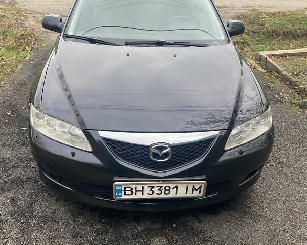 Черный Мазда 6, объемом двигателя 2 л и пробегом 416 тыс. км за 4800 $, фото 1 на Automoto.ua