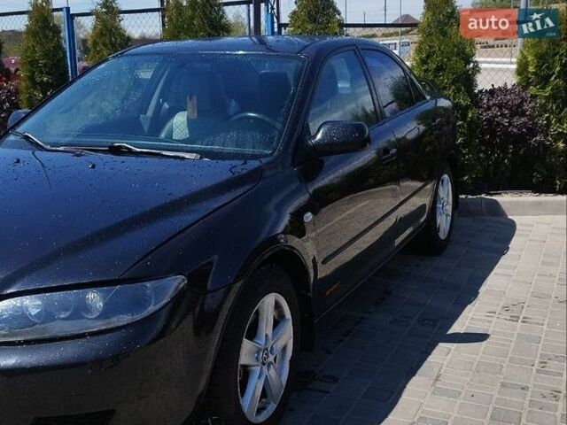 Черный Мазда 6, объемом двигателя 2 л и пробегом 303 тыс. км за 3600 $, фото 4 на Automoto.ua