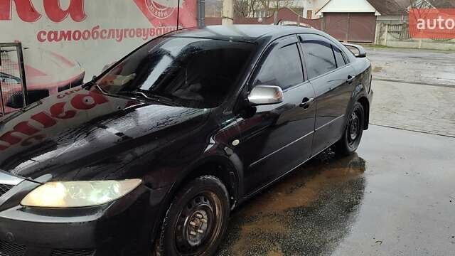 Черный Мазда 6, объемом двигателя 2 л и пробегом 317 тыс. км за 3000 $, фото 3 на Automoto.ua