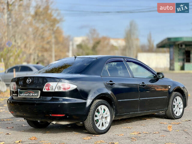 Чорний Мазда 6, об'ємом двигуна 2 л та пробігом 242 тис. км за 3799 $, фото 3 на Automoto.ua