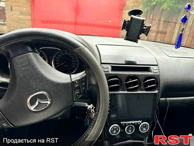 Черный Мазда 6, объемом двигателя 2 л и пробегом 270 тыс. км за 3300 $, фото 4 на Automoto.ua
