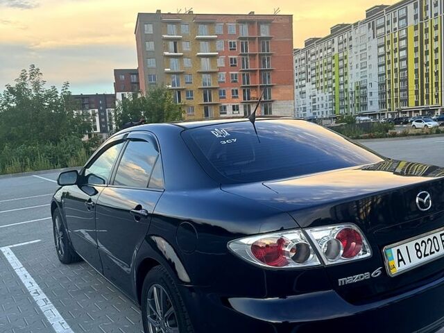 Чорний Мазда 6, об'ємом двигуна 2 л та пробігом 345 тис. км за 3700 $, фото 1 на Automoto.ua