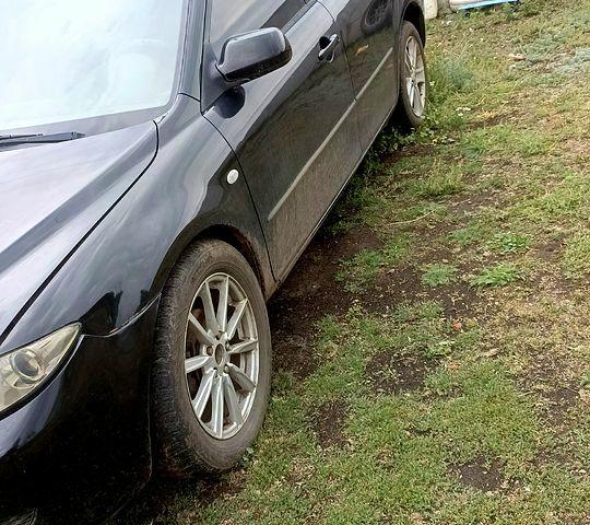 Черный Мазда 6, объемом двигателя 1.8 л и пробегом 283 тыс. км за 4500 $, фото 4 на Automoto.ua