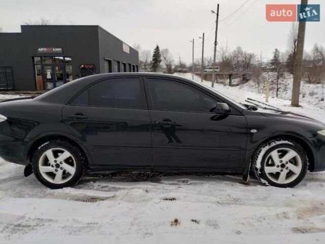 Черный Мазда 6, объемом двигателя 2 л и пробегом 350 тыс. км за 2400 $, фото 4 на Automoto.ua