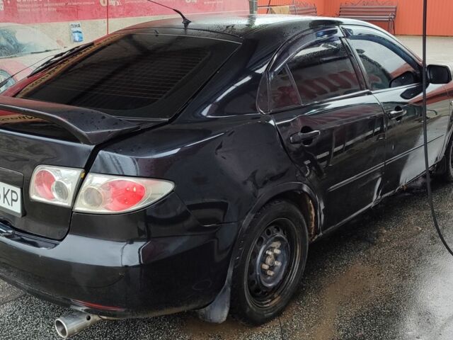 Черный Мазда 6, объемом двигателя 2 л и пробегом 317 тыс. км за 3000 $, фото 5 на Automoto.ua