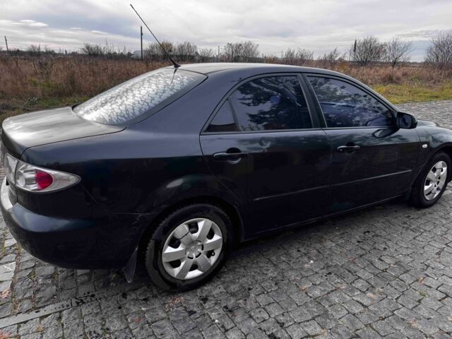 Черный Мазда 6, объемом двигателя 1.8 л и пробегом 250 тыс. км за 2000 $, фото 7 на Automoto.ua