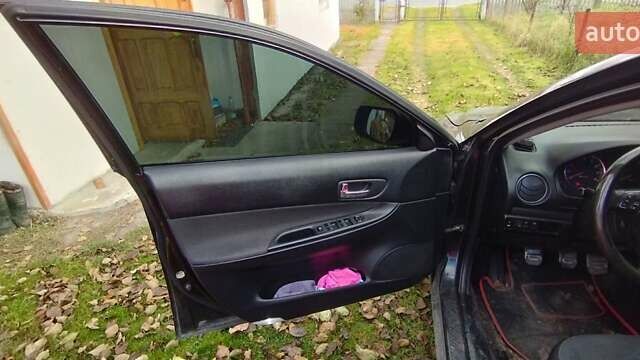 Черный Мазда 6, объемом двигателя 1.8 л и пробегом 350 тыс. км за 2500 $, фото 8 на Automoto.ua