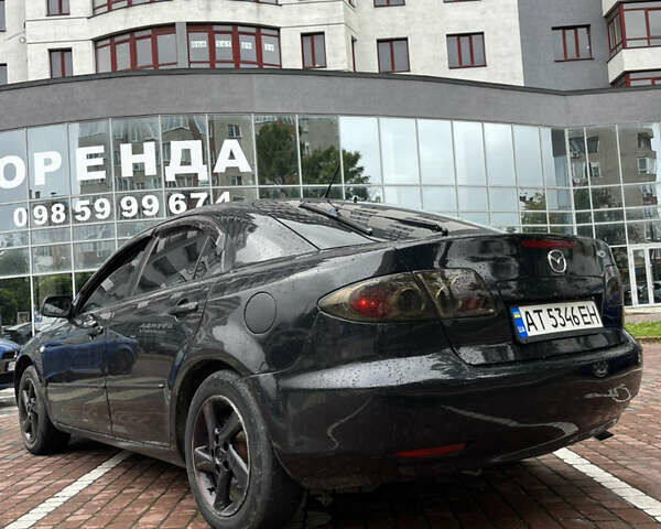 Черный Мазда 6, объемом двигателя 2 л и пробегом 390 тыс. км за 2699 $, фото 8 на Automoto.ua