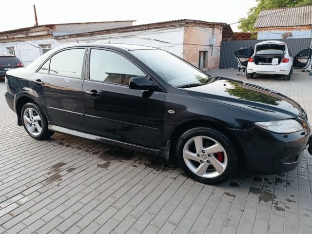 Черный Мазда 6, объемом двигателя 2 л и пробегом 300 тыс. км за 4500 $, фото 4 на Automoto.ua