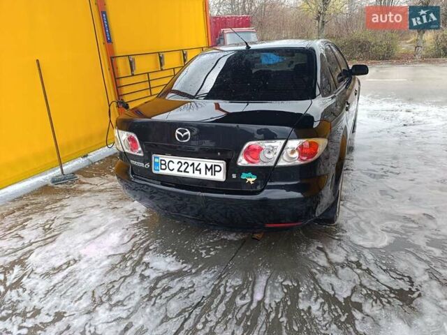 Чорний Мазда 6, об'ємом двигуна 2 л та пробігом 314 тис. км за 3800 $, фото 3 на Automoto.ua