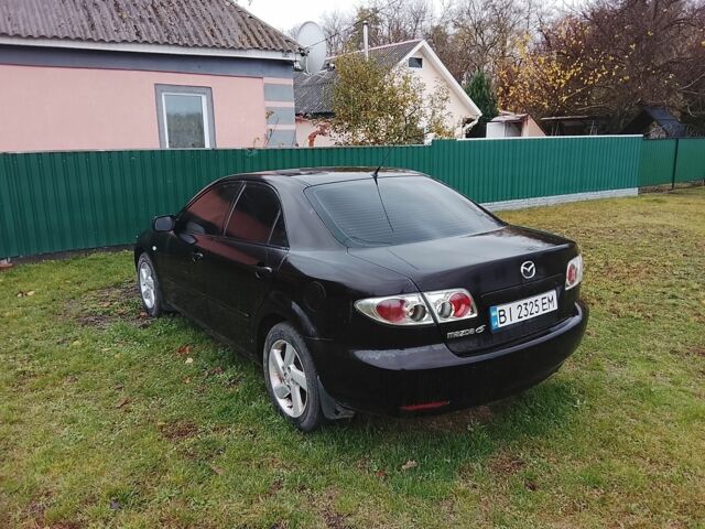 Черный Мазда 6, объемом двигателя 2 л и пробегом 99 тыс. км за 2500 $, фото 2 на Automoto.ua