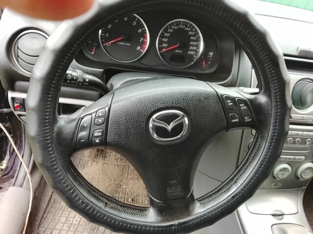 Черный Мазда 6, объемом двигателя 2 л и пробегом 99 тыс. км за 2500 $, фото 4 на Automoto.ua