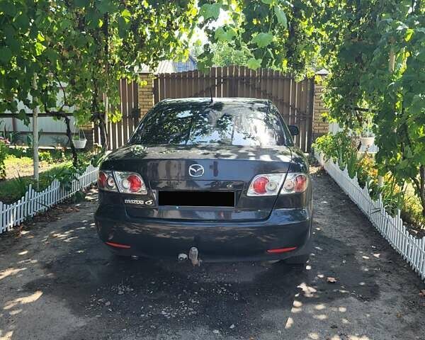 Черный Мазда 6, объемом двигателя 2 л и пробегом 276 тыс. км за 3700 $, фото 7 на Automoto.ua