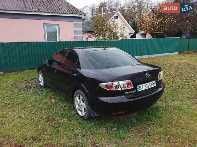 Мазда 6 2004 в Гребенке на Automoto.ua Черный Мазда 6, объемом двигателя 2 л и пробегом 100 тыс. км за 2500 $, фото 16 на Automoto.ua