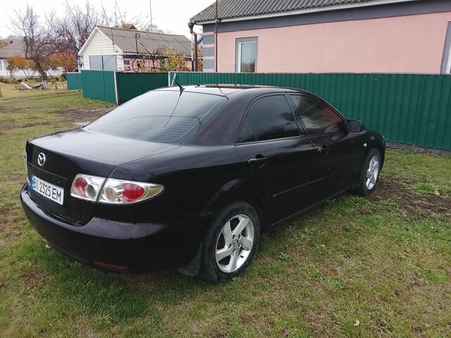 Черный Мазда 6, объемом двигателя 2 л и пробегом 99 тыс. км за 2500 $, фото 3 на Automoto.ua