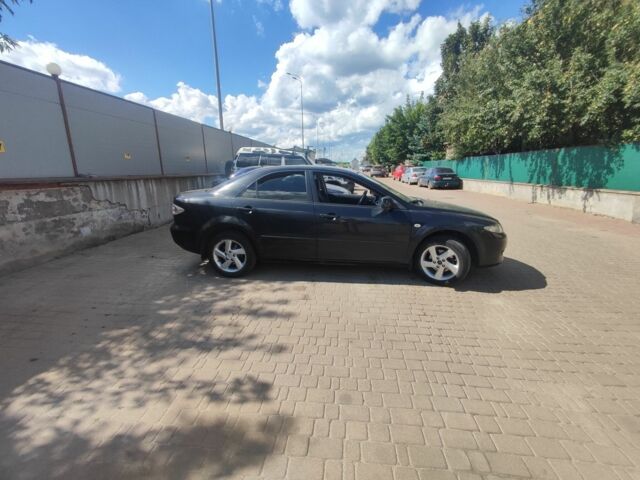 Чорний Мазда 6, об'ємом двигуна 2 л та пробігом 255 тис. км за 2999 $, фото 1 на Automoto.ua