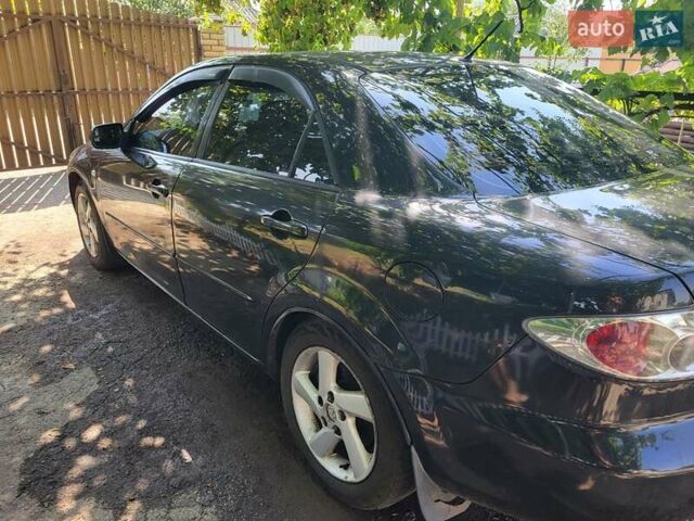 Черный Мазда 6, объемом двигателя 2 л и пробегом 276 тыс. км за 3700 $, фото 6 на Automoto.ua