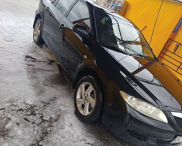 Чорний Мазда 6, об'ємом двигуна 2 л та пробігом 314 тис. км за 3800 $, фото 2 на Automoto.ua