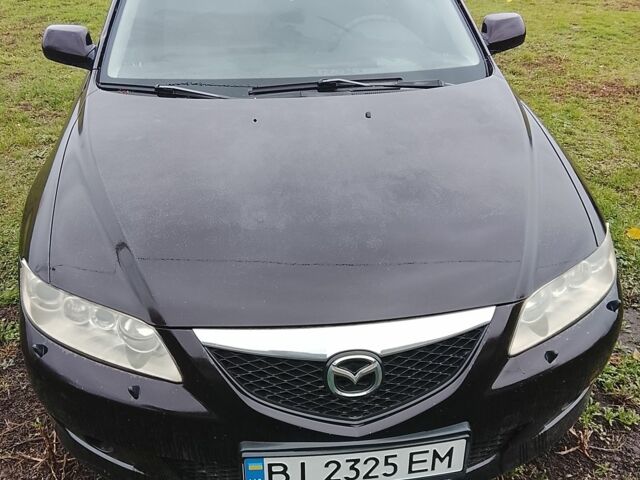 Черный Мазда 6, объемом двигателя 2 л и пробегом 99 тыс. км за 2500 $, фото 1 на Automoto.ua