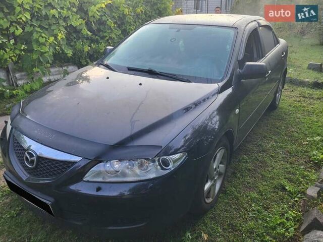 Черный Мазда 6, объемом двигателя 2 л и пробегом 276 тыс. км за 3700 $, фото 4 на Automoto.ua