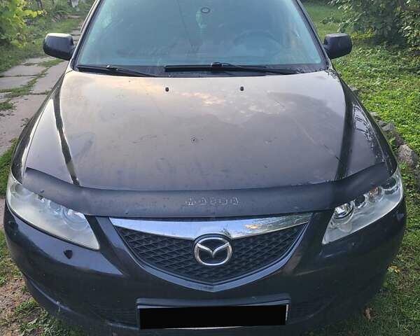Черный Мазда 6, объемом двигателя 2 л и пробегом 276 тыс. км за 3700 $, фото 2 на Automoto.ua