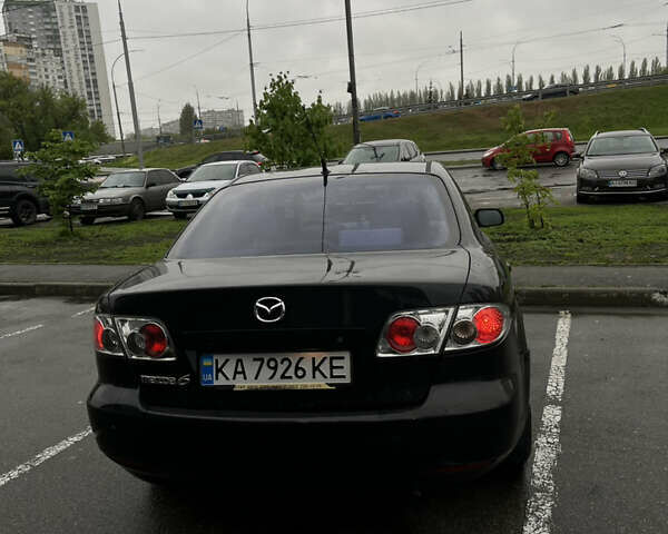 Черный Мазда 6, объемом двигателя 1.8 л и пробегом 260 тыс. км за 3600 $, фото 6 на Automoto.ua