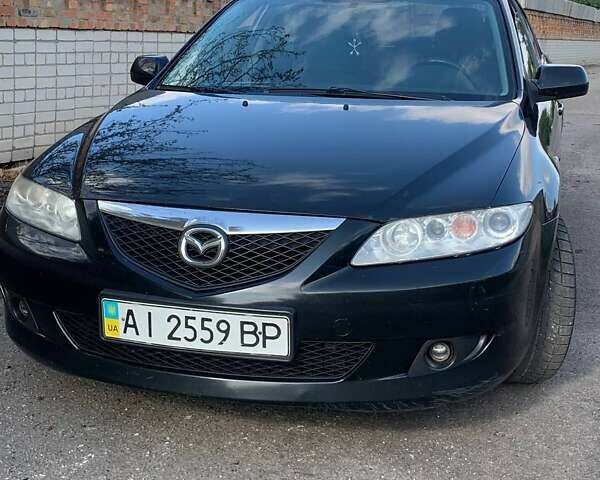 Черный Мазда 6, объемом двигателя 2 л и пробегом 375 тыс. км за 3900 $, фото 2 на Automoto.ua