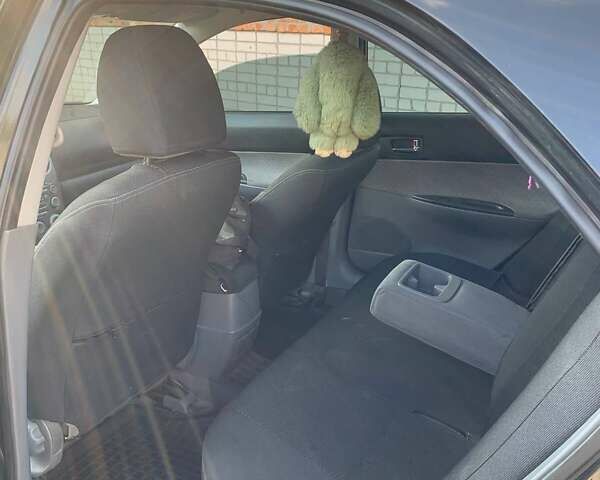 Черный Мазда 6, объемом двигателя 2 л и пробегом 375 тыс. км за 3900 $, фото 5 на Automoto.ua